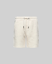 Kids Dustin Sweatshort, cream, relaxed fit, with an all-over embossed checkerboard pattern featuring alternating Psycho Bunny skull logos and textured squares, plus a drawstring waist.