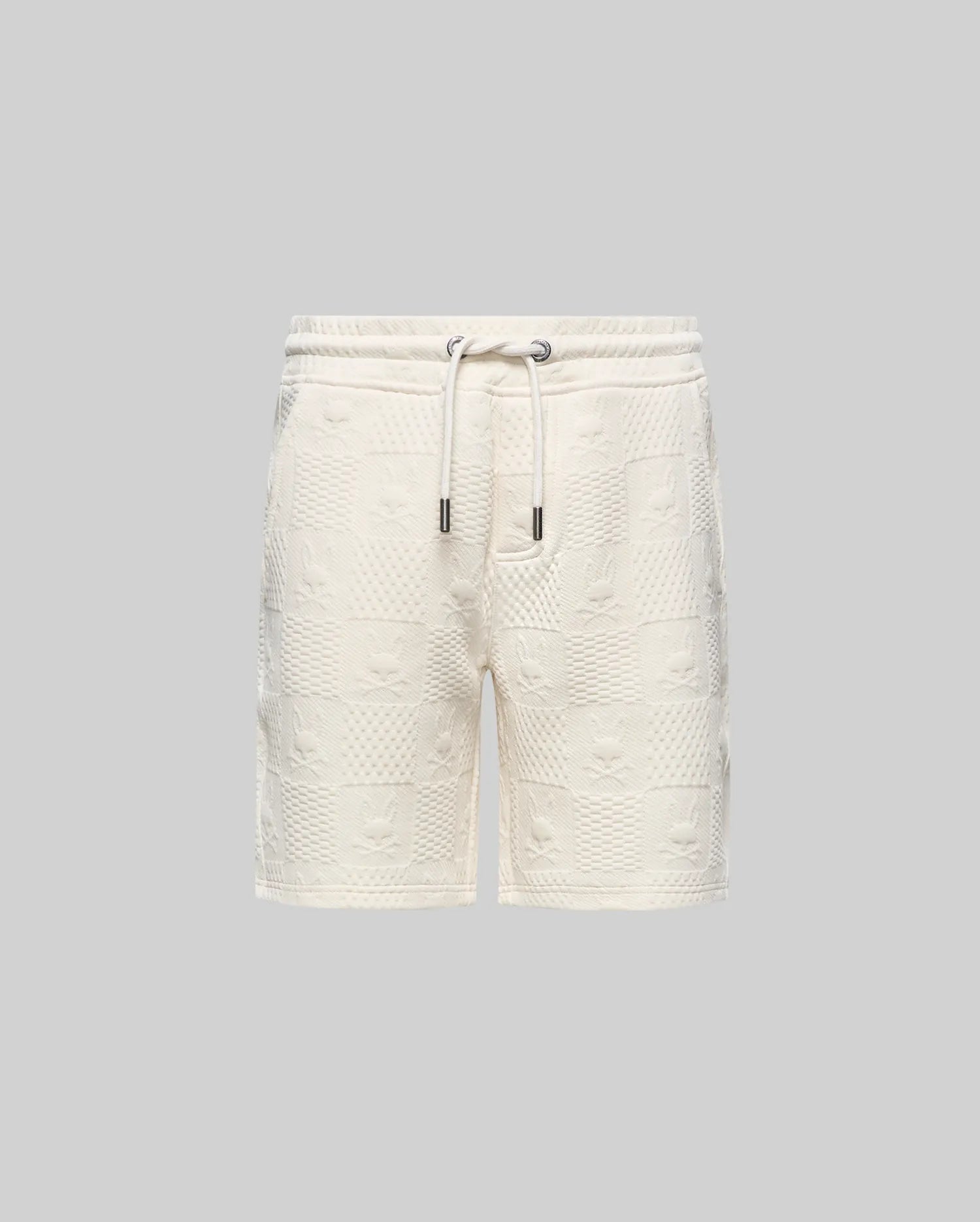 Kids Dustin Sweatshort, cream, relaxed fit, with an all-over embossed checkerboard pattern featuring alternating Psycho Bunny skull logos and textured squares, plus a drawstring waist.