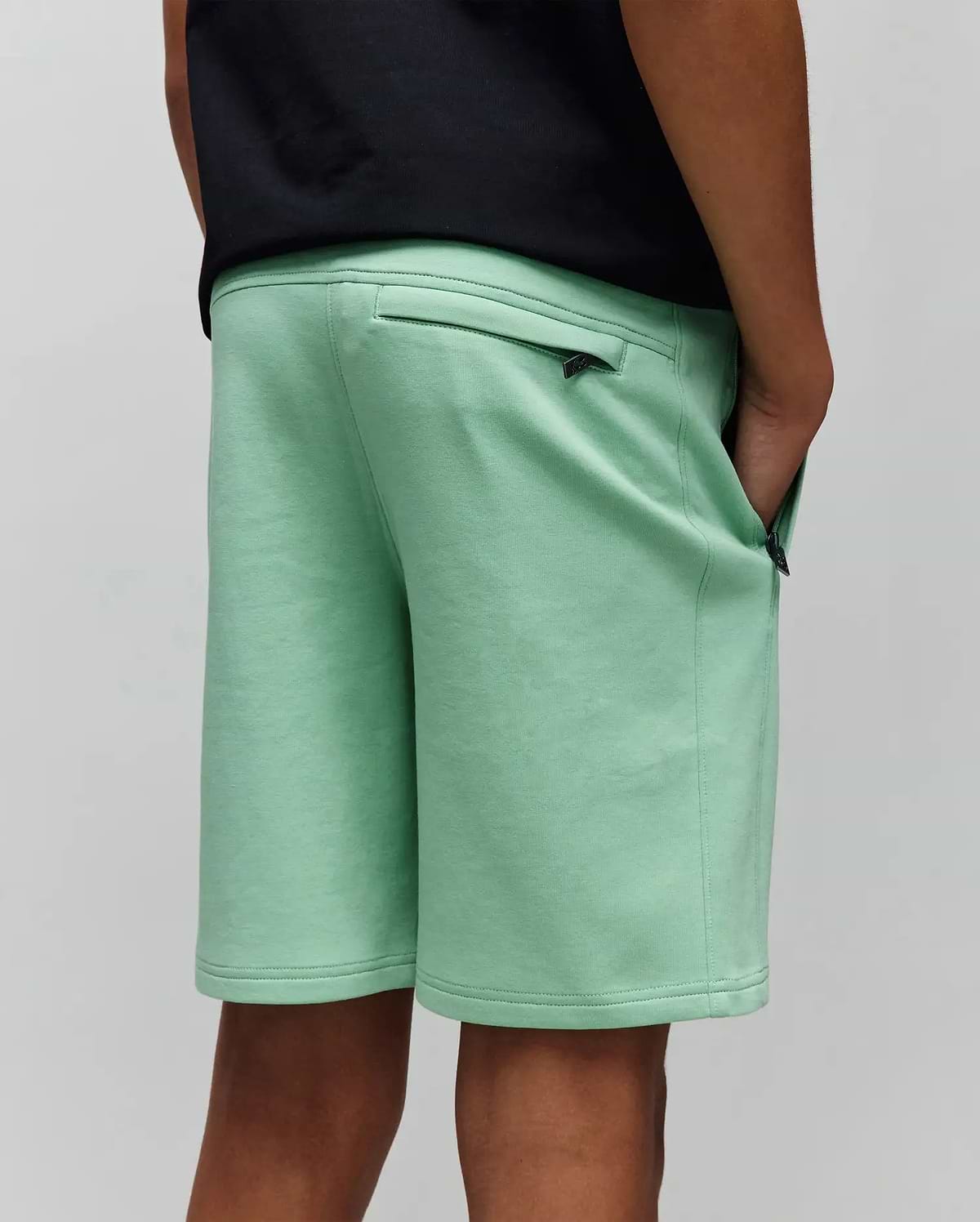 Kids Barry Modal Short, mint green, relaxed fit, soft modal blend fabric, featuring zippered back and side pockets with small black Psycho Bunny skull logo zipper pulls.