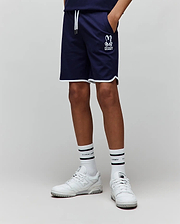 Kids Toby Short, navy smooth knit with a relaxed fit, featuring white piping on the hem, white drawstrings, and a medium-sized white printed Psycho Bunny skull logo on the left thigh.