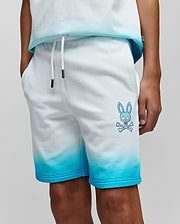 Kids Dax Sweatshort in soft french terry, featuring a white to blue ombre fade, relaxed fit, drawstring waist, and a large blue Psycho Bunny skull logo on the left thigh. (2)
