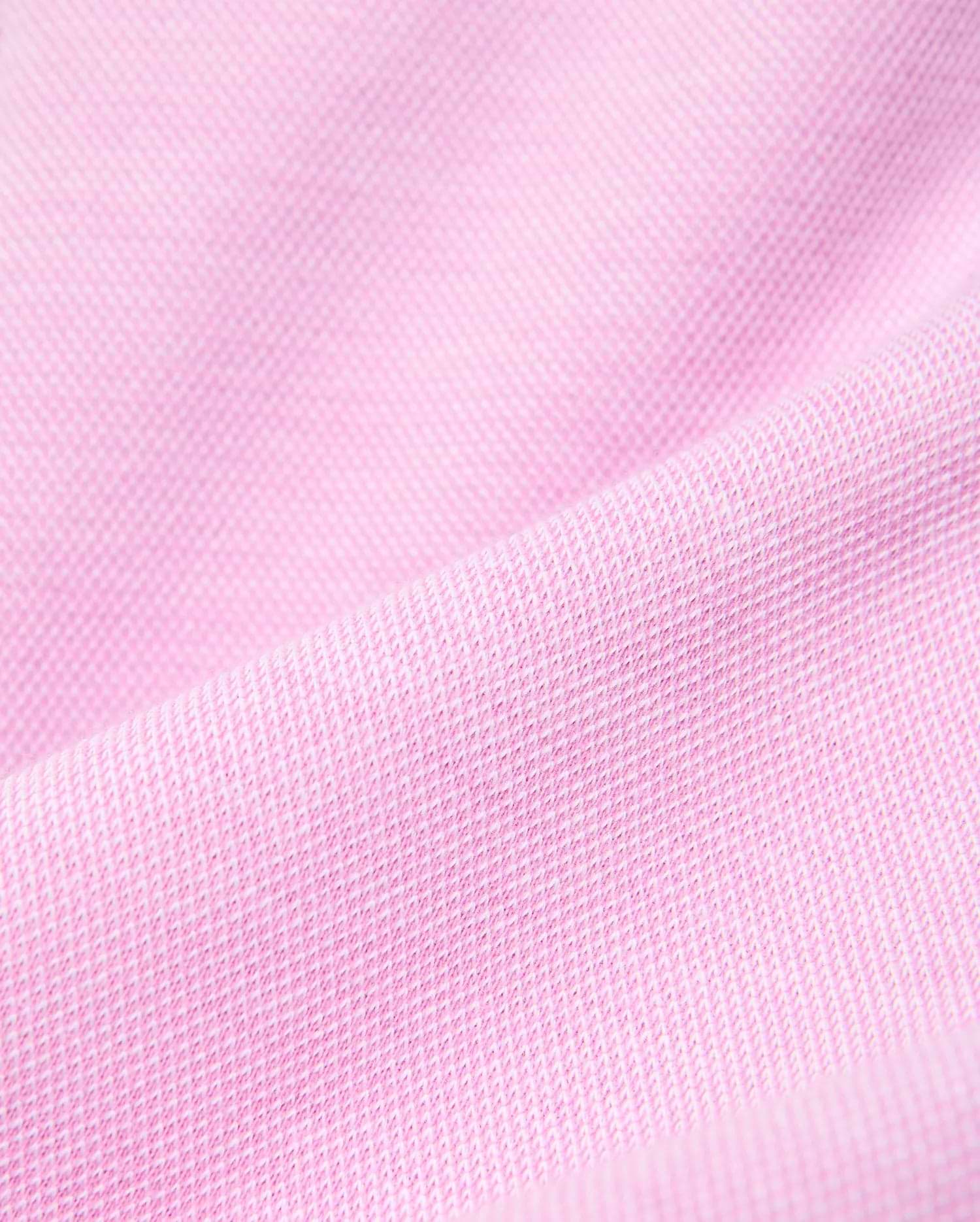 Kids Keith Short 3 1/2 crafted from a luxurious, breathable pink pique knit fabric, highlighting the refined texture and quality of Psycho Bunny's premium streetwear collection.