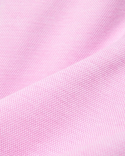Kids Keith Short 3 1/2 crafted from a luxurious, breathable pink pique knit fabric, highlighting the refined texture and quality of Psycho Bunny's premium streetwear collection.