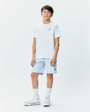 White classic fit jersey t-shirt with a small embroidered Psycho Bunny skull logo wearing sunglasses on the left chest, paired with light blue Kids Keith Short 3 1/2 with a small embroidered Psycho Bunny logo on the left leg. (4)
