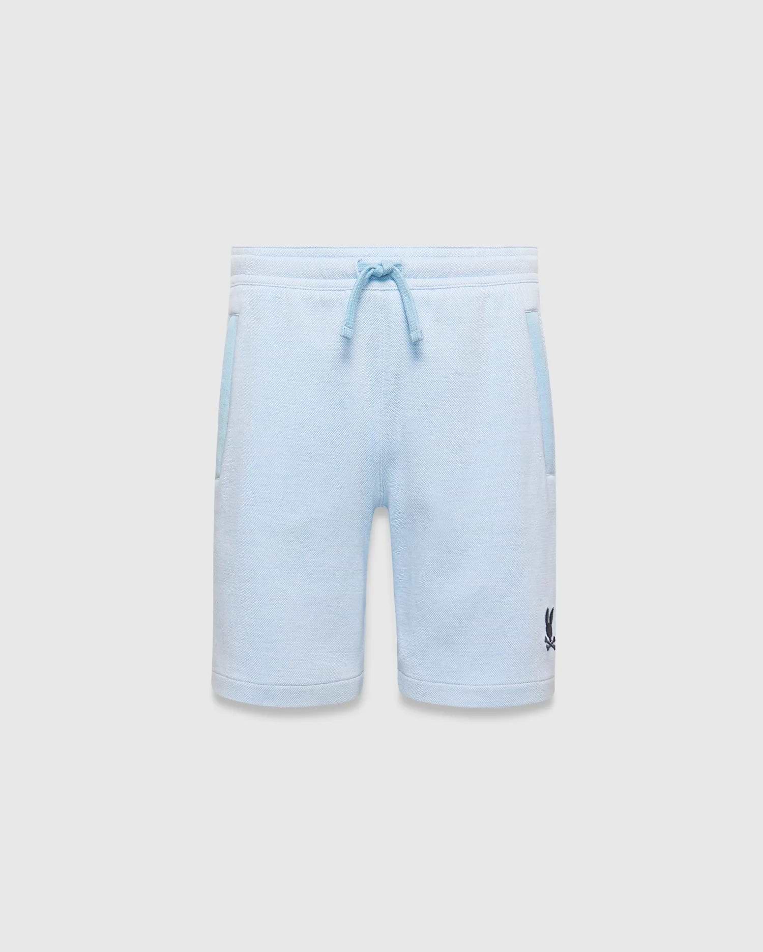 Kids Keith Short: Relaxed fit light blue heathered jersey knit shorts with a drawstring waist, lighter blue pocket trim, and a small dark blue embroidered Psycho Bunny skull logo on the lower left leg. (5)