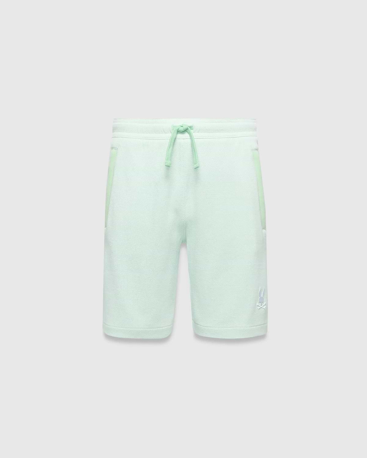 Kids Keith Short in mint green jersey knit, featuring a relaxed fit, lighter mint drawstrings, side pockets with subtle accent trim, and a small white embroidered Psycho Bunny skull logo on the lower left leg. (4)