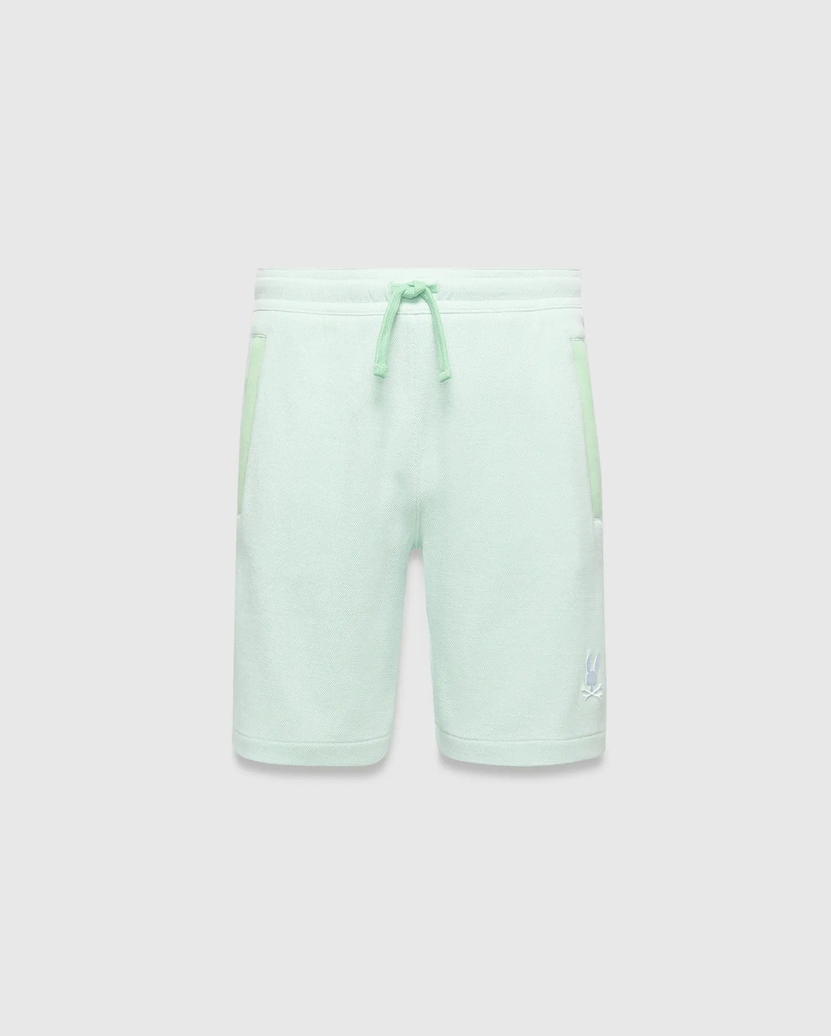 Kids Keith Short in mint green jersey knit, featuring a relaxed fit, lighter mint drawstrings, side pockets with subtle accent trim, and a small white embroidered Psycho Bunny skull logo on the lower left leg. (4)