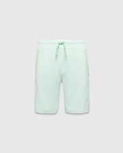 Kids Keith Short in mint green jersey knit, featuring a relaxed fit, lighter mint drawstrings, side pockets with subtle accent trim, and a small white embroidered Psycho Bunny skull logo on the lower left leg. (4)