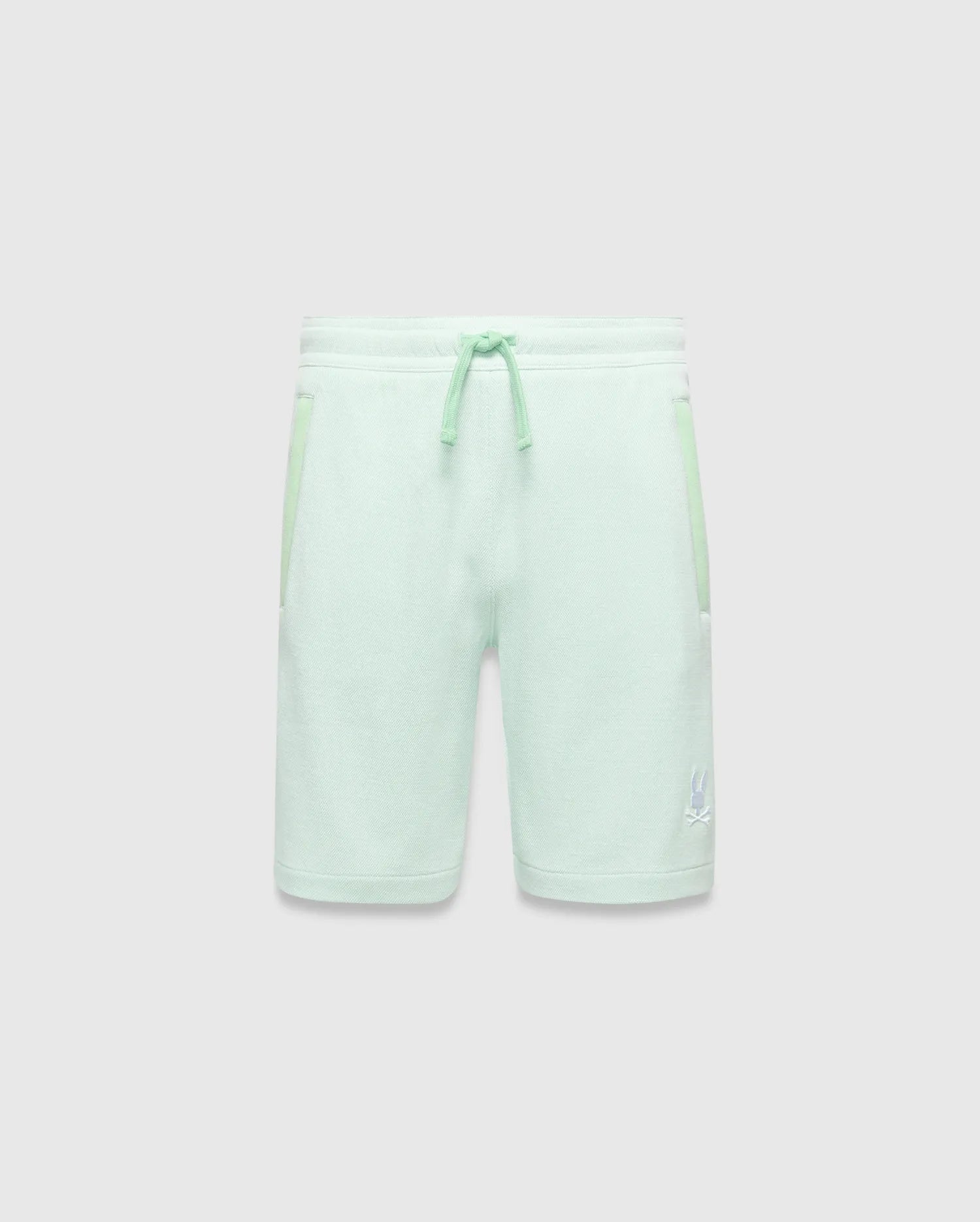 Kids Keith Short in mint green jersey knit, featuring a relaxed fit, lighter mint drawstrings, side pockets with subtle accent trim, and a small white embroidered Psycho Bunny skull logo on the lower left leg. (4)