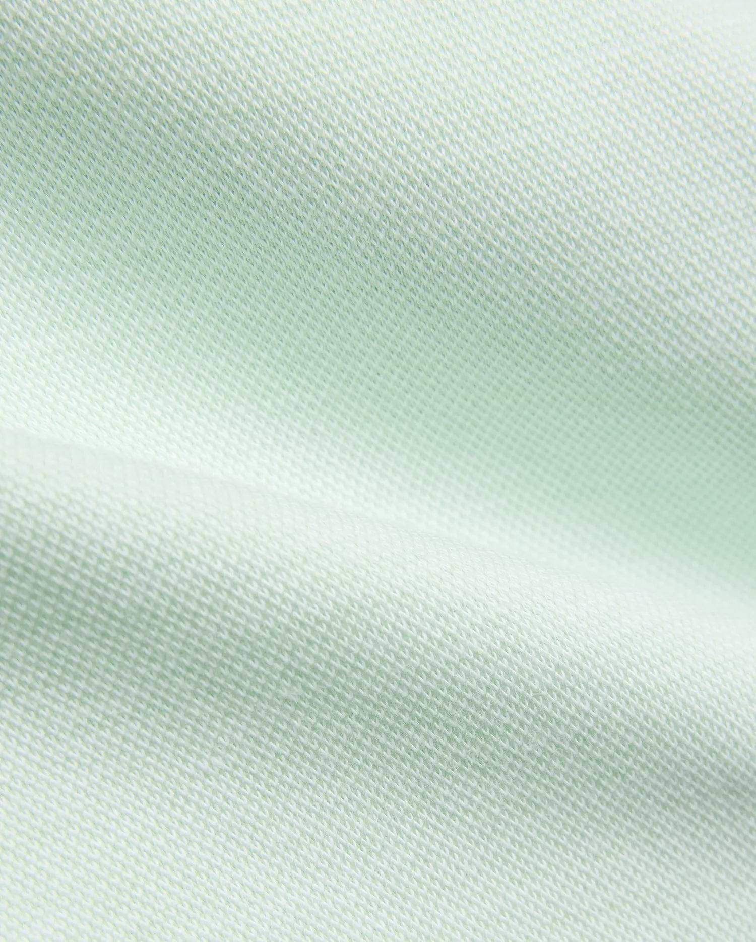 Psycho Bunny Kids Keith Short 3 1/2, crafted from a premium, breathable pale mint green pique fabric with a distinct textured weave, embodying refined streetwear comfort. (5)