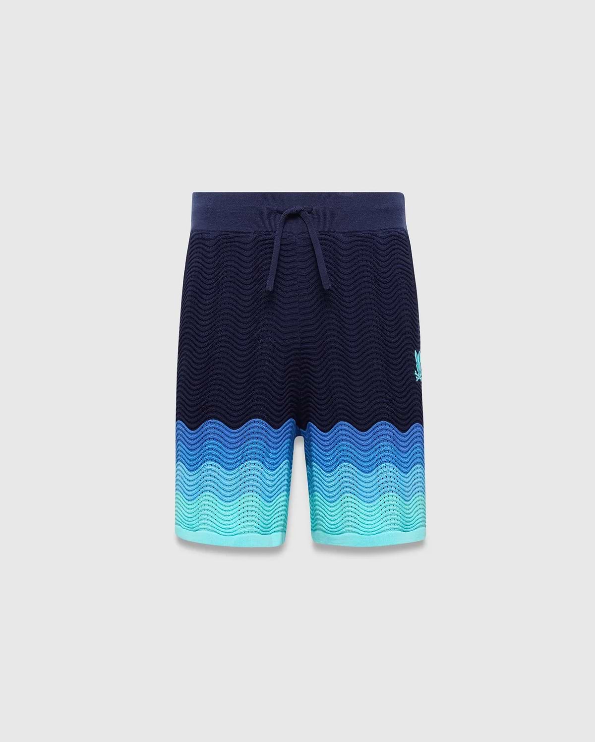 Kids Holden Knit Short in navy with a wavy knit texture, featuring a blue to teal gradient hem and a small embroidered Psycho Bunny skull logo on the right thigh. (5)