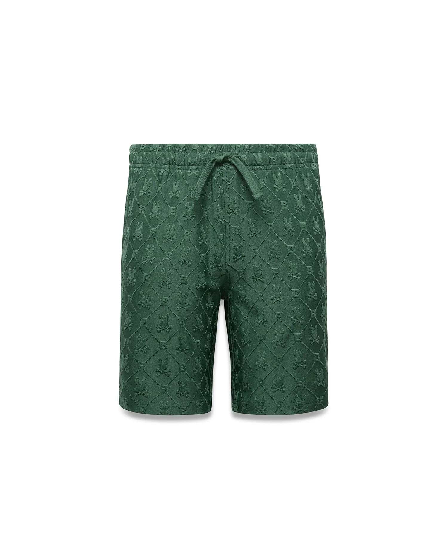 Kids Garry Jacquard Sweatshort in forest green, featuring a relaxed fit and an all-over jacquard knit pattern of repeated Psycho Bunny skull logos within a diamond grid.