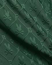 Kids Garry Jacquard Sweatshort in deep forest green, featuring an all-over textured jacquard knit pattern of the iconic Psycho Bunny skull logo within diamond shapes.