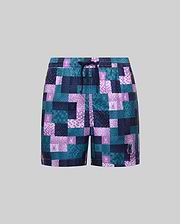 Kids Olivier All Over Bunny Swim Trunk with a pixelated teal, purple, and navy pattern, all-over bunny skull logo print, drawstring waist, and a larger embroidered logo.