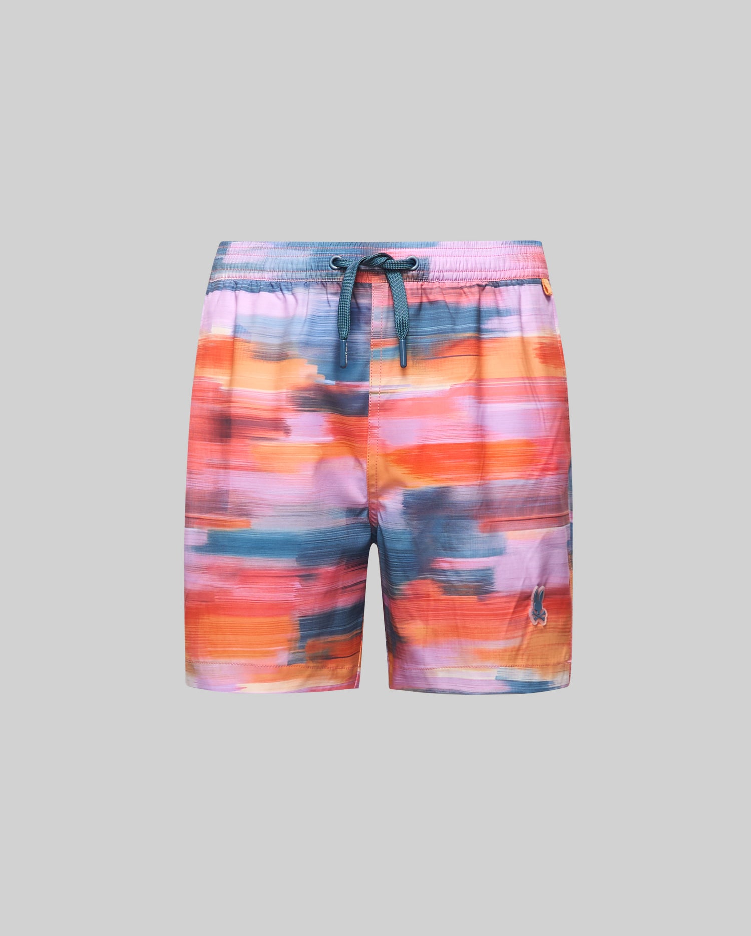 Kids Raphael Swim Trunk featuring a vibrant multi-color abstract brushstroke pattern in pink, orange, blue, and teal, with an elastic waistband, teal drawstring, and a small embroidered Psycho Bunny skull logo on the left leg.