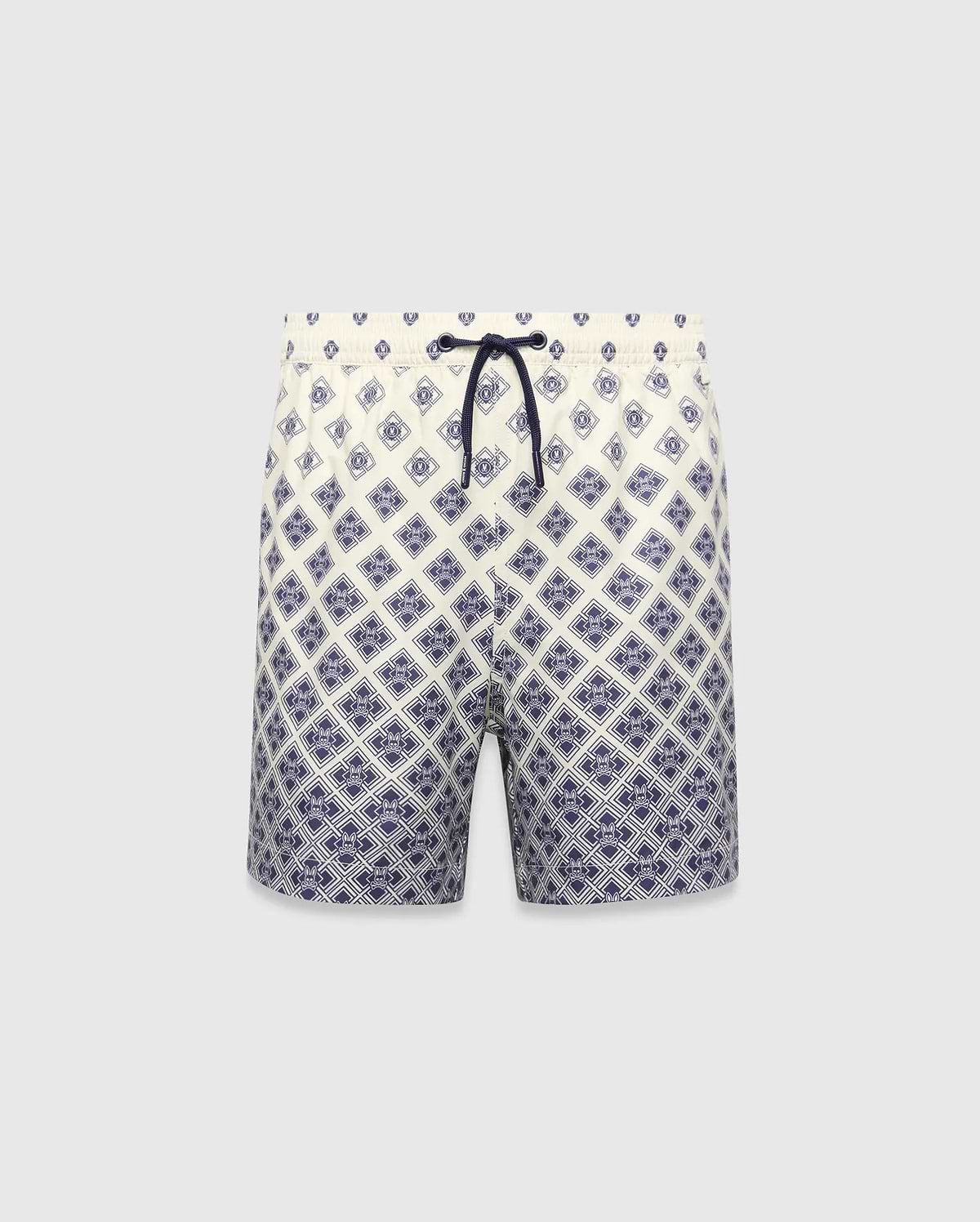 Kids Tobias Swim Trunk in cream with a navy blue diamond grid pattern featuring repeated Psycho Bunny skull logos, a relaxed fit, and a navy drawstring. The pattern intensifies towards the hem. (5)