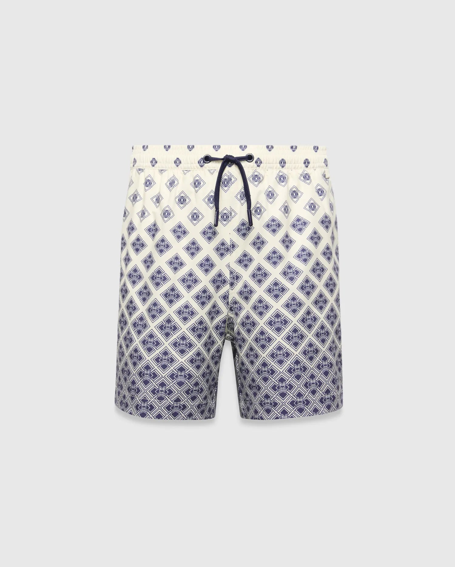 Kids Tobias Swim Trunk in cream with a navy blue diamond grid pattern featuring repeated Psycho Bunny skull logos, a relaxed fit, and a navy drawstring. The pattern intensifies towards the hem. (5)