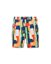 Kids Wes All Over Print Swim Trunk featuring a vibrant multi-color geometric pattern in navy, orange, red, green, and yellow, with small repeated Psycho Bunny skull logos and a blue drawstring.