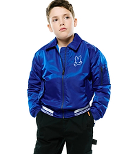 Kids Nathaniel Satin Coach Jacket in royal blue, shiny satin, full-zip, collared, with ribbed cuffs/hem and white stripes, plus a large white outline Psycho Bunny skull logo on the left chest.