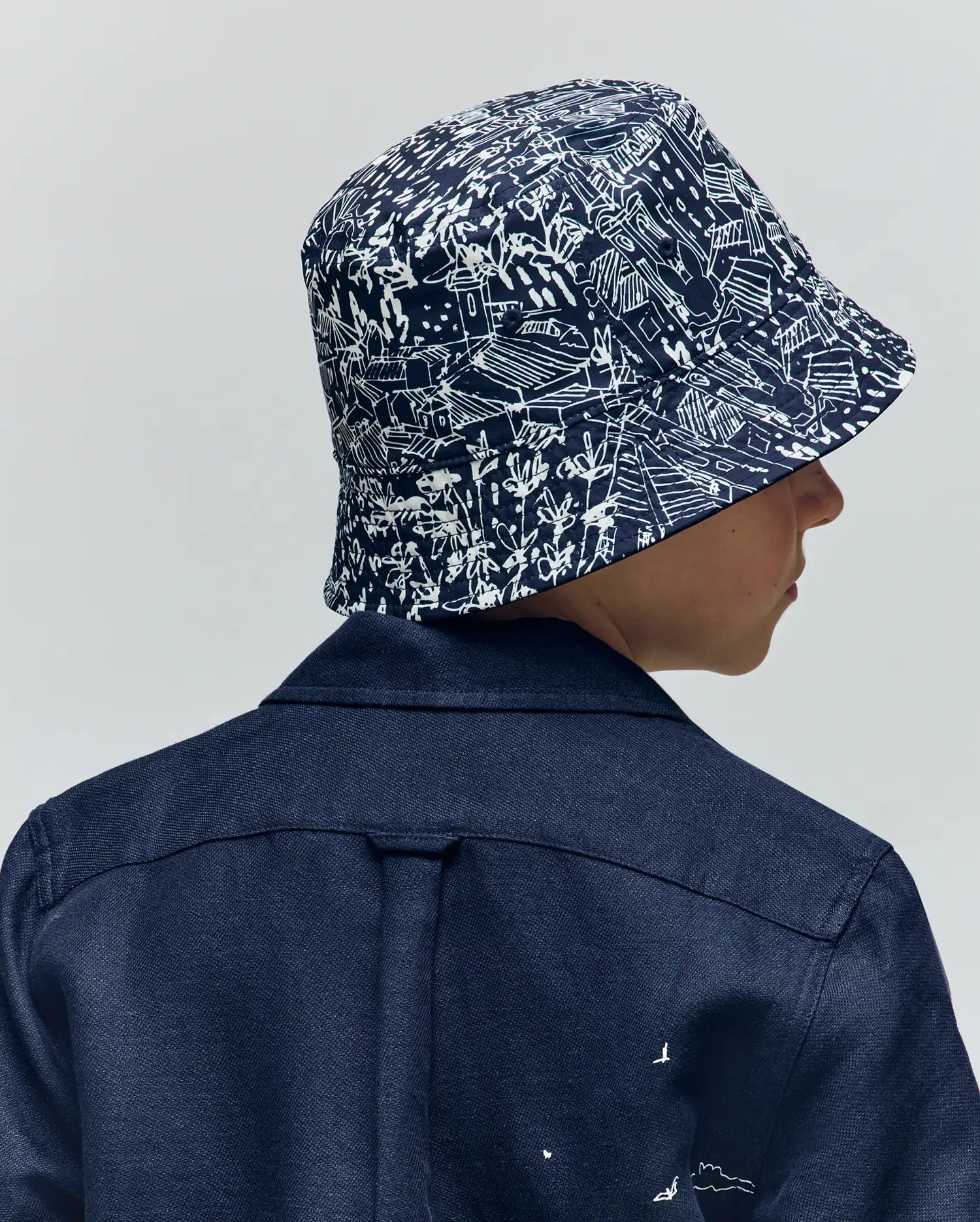 Kids Blue Naxos Reversible Bucket Hat | Psycho Bunny