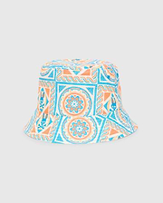 Kids Frank Reversible Bucket Hat in white with an all-over vibrant blue and orange mosaic pattern, featuring repeated small Psycho Bunny skull logos and floral motifs.