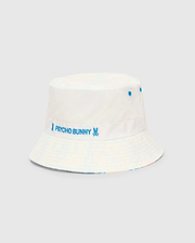 Kids Frank Reversible Bucket Hat in white, featuring a blue embroidered Psycho Bunny text and skull logo on the band, blue eyelets, and a subtle multicolor pattern on the reverse side.