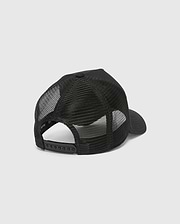 Black Kids Isaac Trucker Cap featuring a breathable mesh back, solid front panel, adjustable snapback closure, and a small inner Psycho Bunny brand tag.