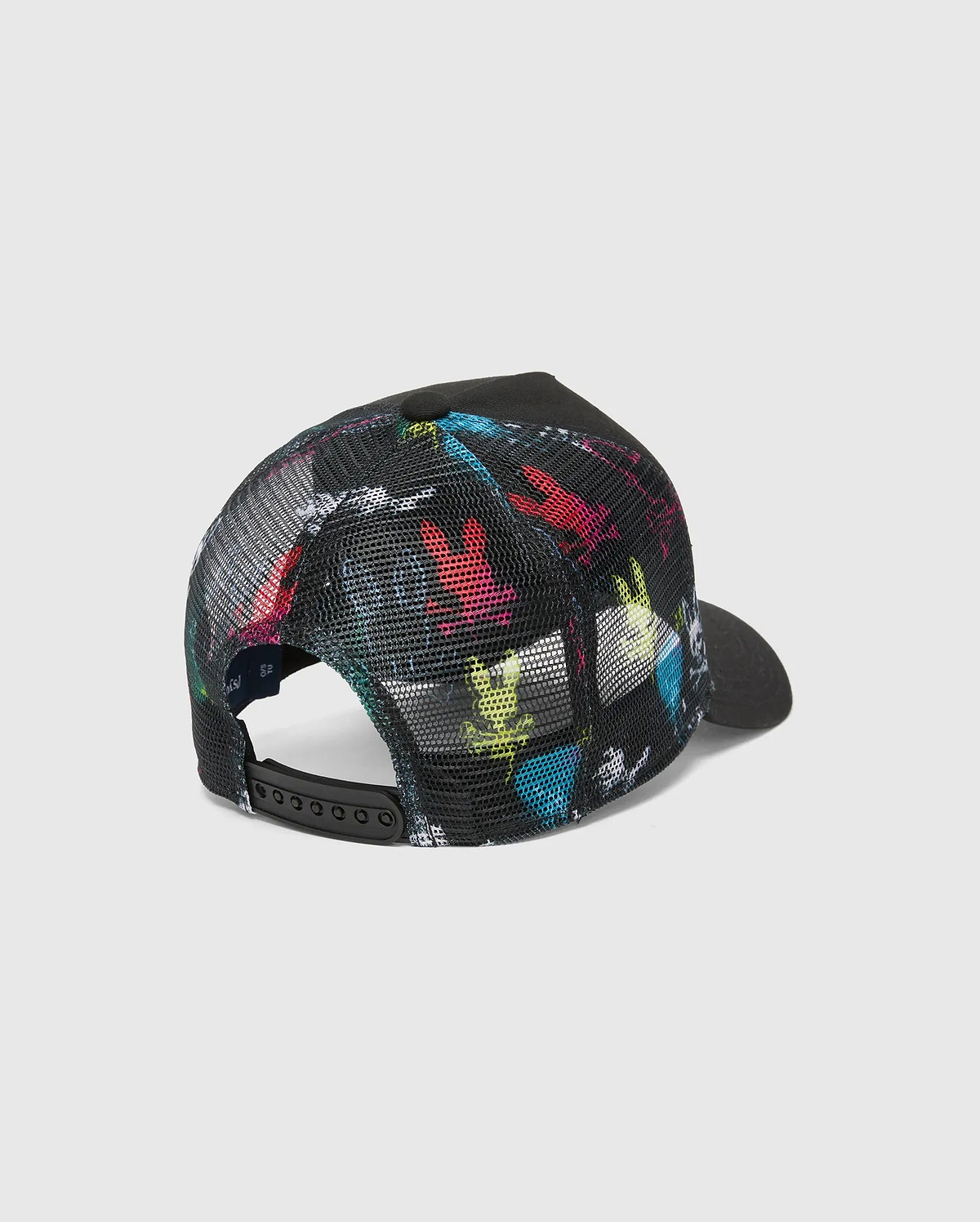 KIDS QUINTIN TRUCKER CAP. Black mesh trucker cap featuring a vibrant, repeating multi-color iconic Psycho Bunny skull print on the front panels, complete with a black adjustable snapback closure.