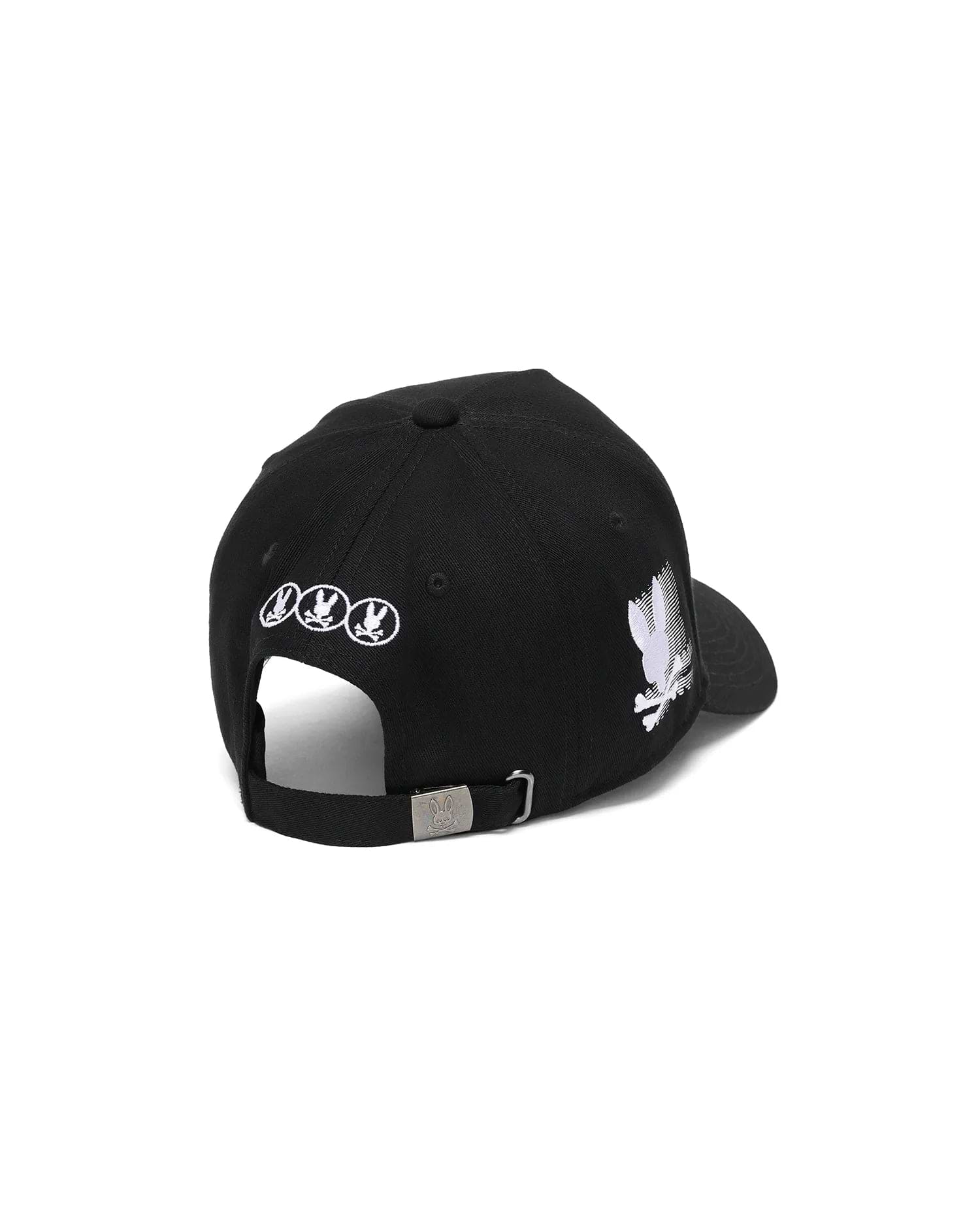 Black Kids Nathaniel A-Frame Trucker Cap with a large white embroidered Psycho Bunny skull logo on the side, three smaller white logos on the back, and a silver buckle featuring an engraved bunny skull.