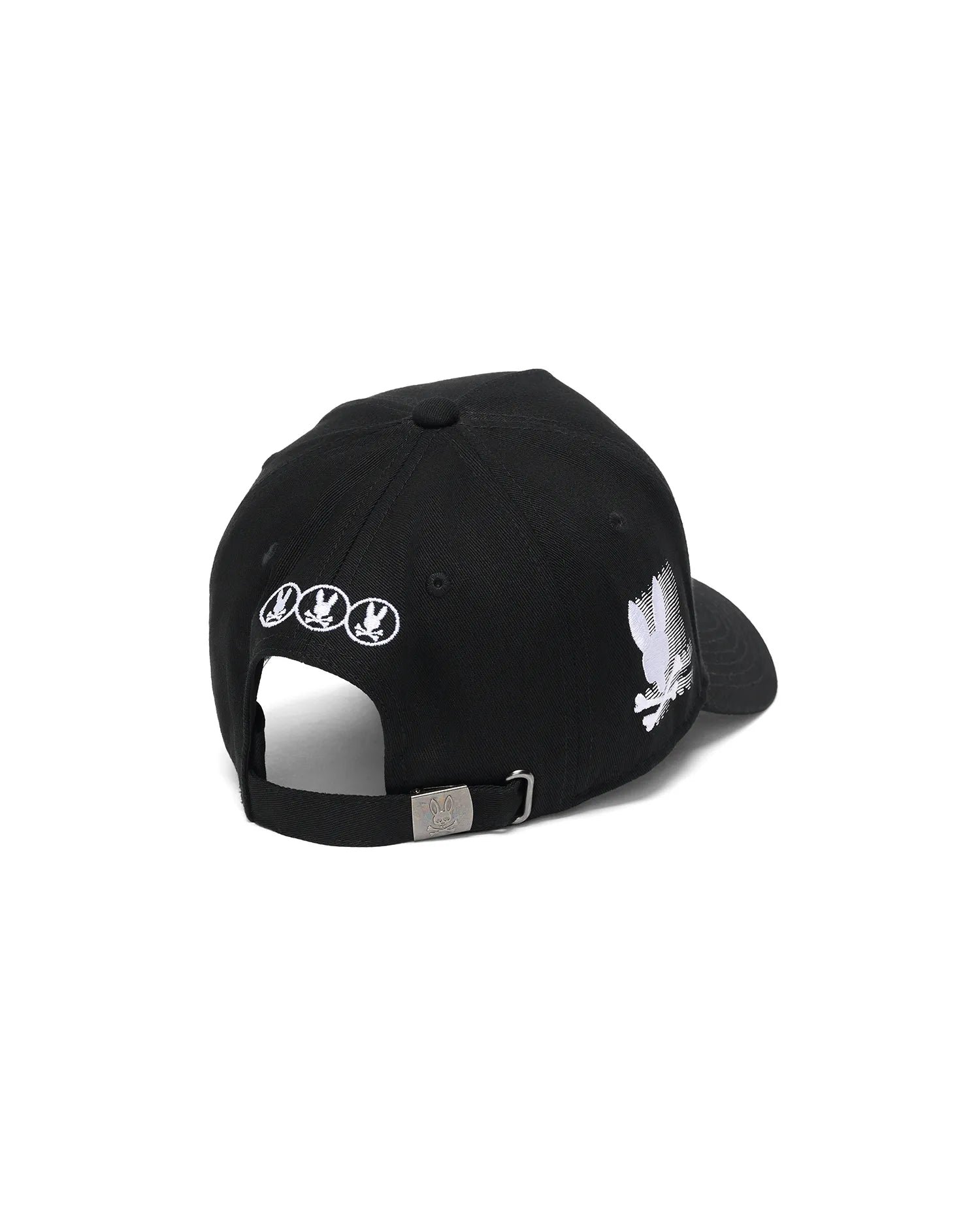 Black Kids Nathaniel A-Frame Trucker Cap with a large white embroidered Psycho Bunny skull logo on the side, three smaller white logos on the back, and a silver buckle featuring an engraved bunny skull.