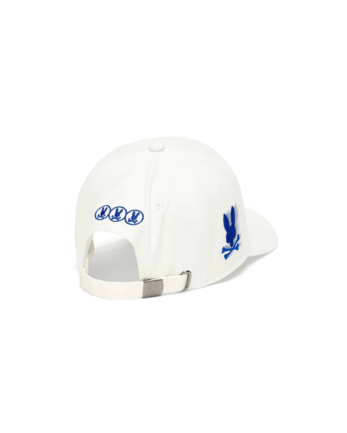 White Kids Nathaniel A-Frame Trucker Cap featuring a prominent blue embroidered Psycho Bunny skull logo on the right side, three smaller blue logos on the back, and an engraved logo on the metal buckle closure.