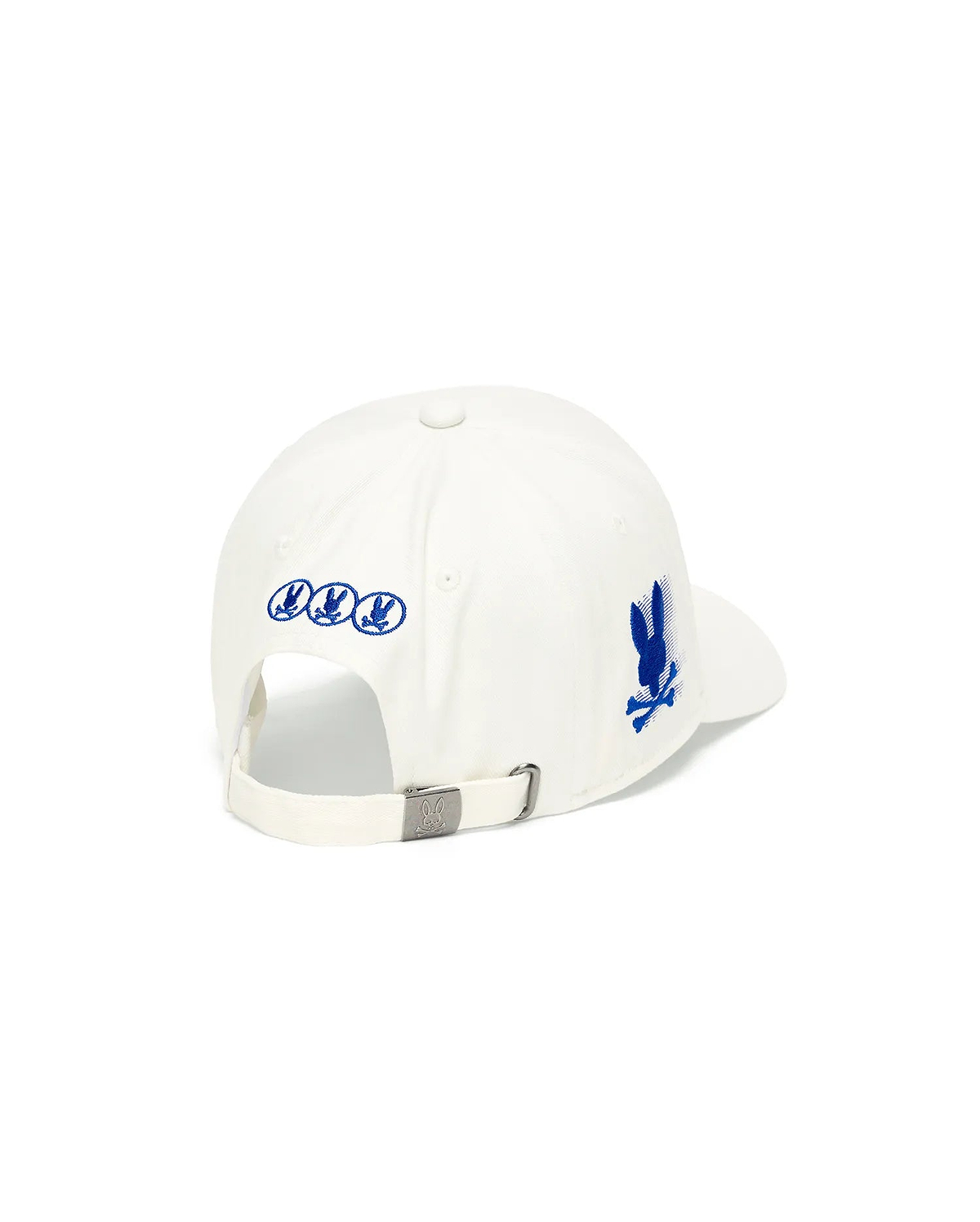White Kids Nathaniel A-Frame Trucker Cap featuring a prominent blue embroidered Psycho Bunny skull logo on the right side, three smaller blue logos on the back, and an engraved logo on the metal buckle closure.