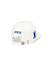 White Kids Nathaniel A-Frame Trucker Cap featuring a prominent blue embroidered Psycho Bunny skull logo on the right side, three smaller blue logos on the back, and an engraved logo on the metal buckle closure.
