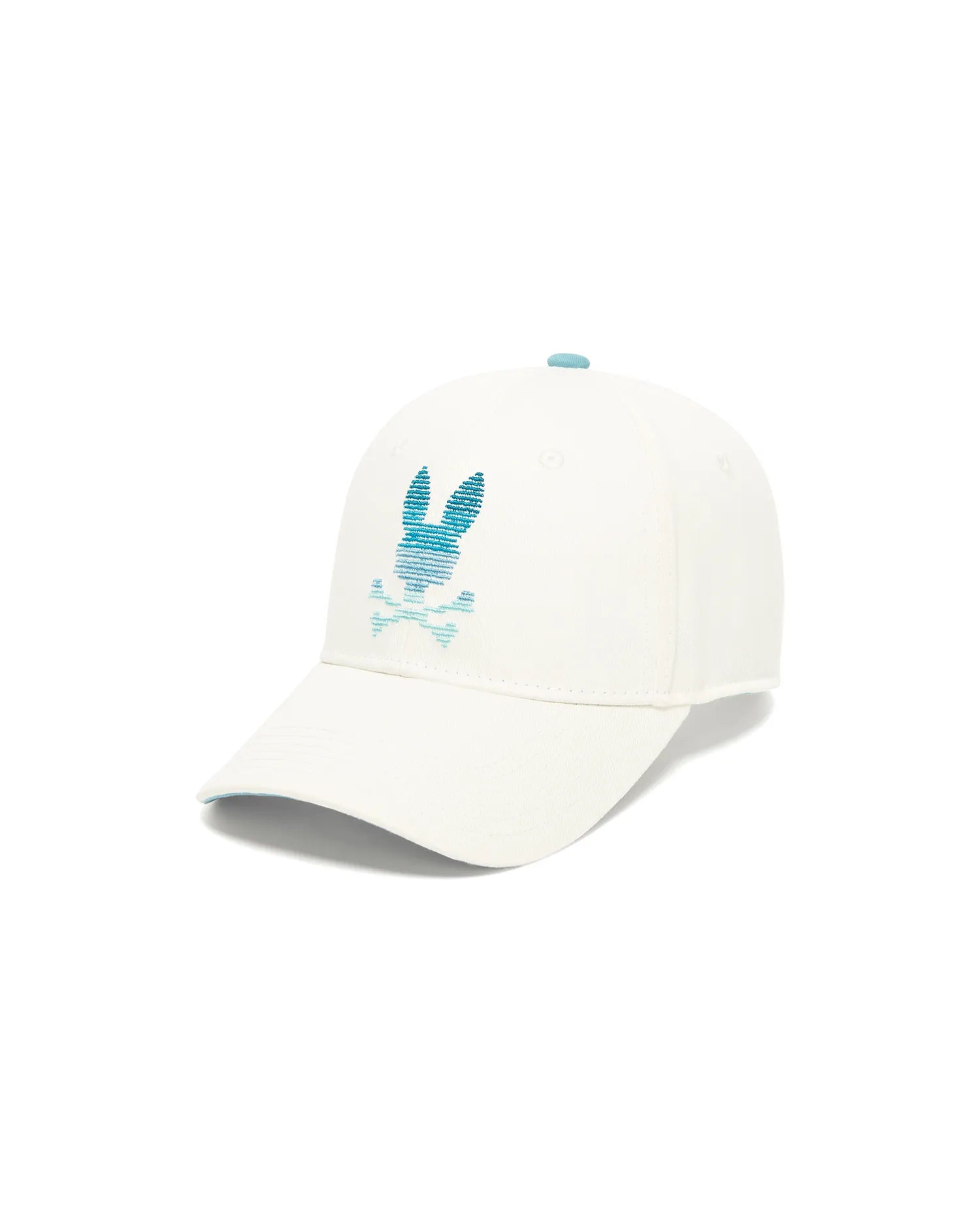 Kids' Slade Baseball Cap in white cotton twill, featuring a large embroidered teal and blue gradient Psycho Bunny skull logo on the front, with a light blue button and under brim. (1)