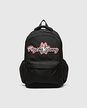 Black KIDS PAL BACKPACK with a large, centered white and red Psycho Bunny skull logo, featuring a front zip pocket and side pockets, made from durable woven fabric.