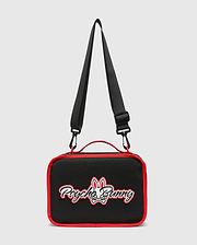 Kids Pal Lunch Box, black with vibrant red piping, featuring a prominent white and red embroidered Psycho Bunny skull logo on the front, complete with an adjustable black strap and red carry handle.