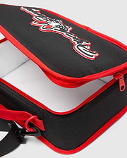 Black Kids Pal Lunch Box with red piping and zipper, featuring a large 3D white and red Psycho Bunny logo on the top, and an adjustable black strap.