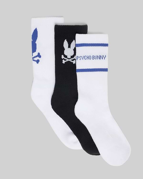 Kids 3 Pack Sport Socks featuring one white pair with a blue bunny skull logo, one black pair with a white bunny skull logo, and one white pair with blue stripes and PSYCHO BUNNY text.