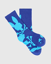 Kids Sunny 3 Pack Sport Socks in royal blue with a light blue all-over Psycho Bunny skull and crossbones pattern, featuring a ribbed knit texture and crew length.