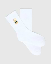 Kids Sunny 3 Pack Sport Socks: White smooth knit sport socks featuring a small, embroidered gold and blue Psycho Bunny skull logo with sunglasses on the ankle cuff.
