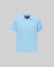 Kids Devon Bubble Stitch Knit Polo in light blue, featuring a textured bubble stitch knit fabric, an open placket, and a small, tonal embroidered Psycho Bunny skull logo on the left chest.