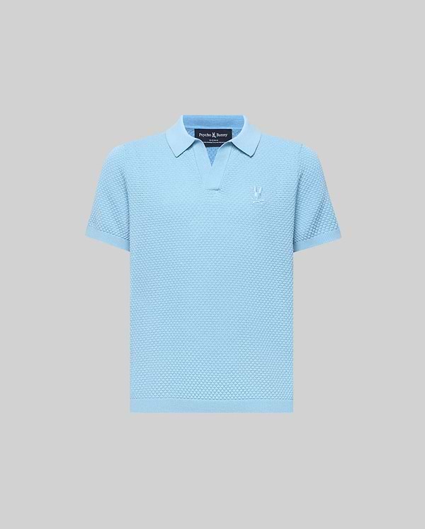 Kids Devon Bubble Stitch Knit Polo in light blue, featuring a textured bubble stitch knit fabric, an open placket, and a small, tonal embroidered Psycho Bunny skull logo on the left chest.