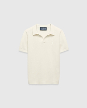 Kids Devon Knit Polo in cream, featuring a textured knit fabric, classic fit, and a small tonal embroidered Psycho Bunny skull logo on the left chest.