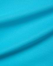 Kids Holden Pique Polo in vibrant aqua blue, crafted from breathable pique knit fabric, featuring the iconic small embroidered Psycho Bunny skull logo on the chest.