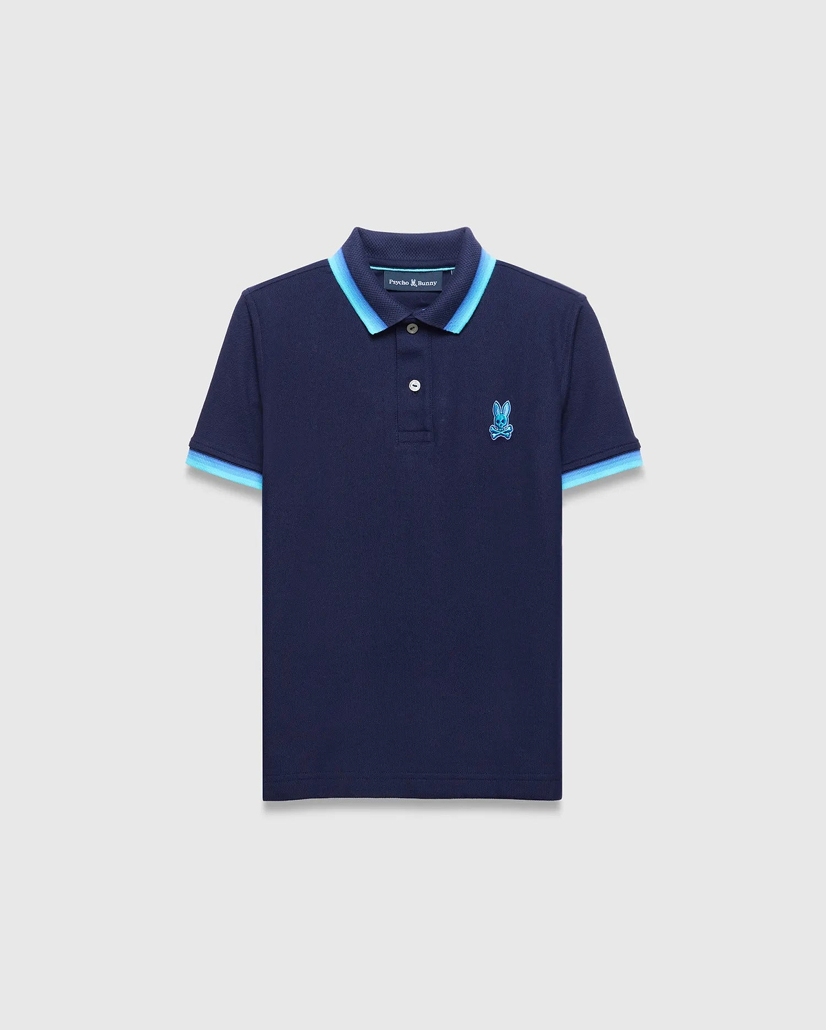 Kids Holden Pique Polo, navy classic fit pique knit with light blue and medium blue striped collar and cuffs, featuring an embroidered Psycho Bunny skull logo on the left chest.