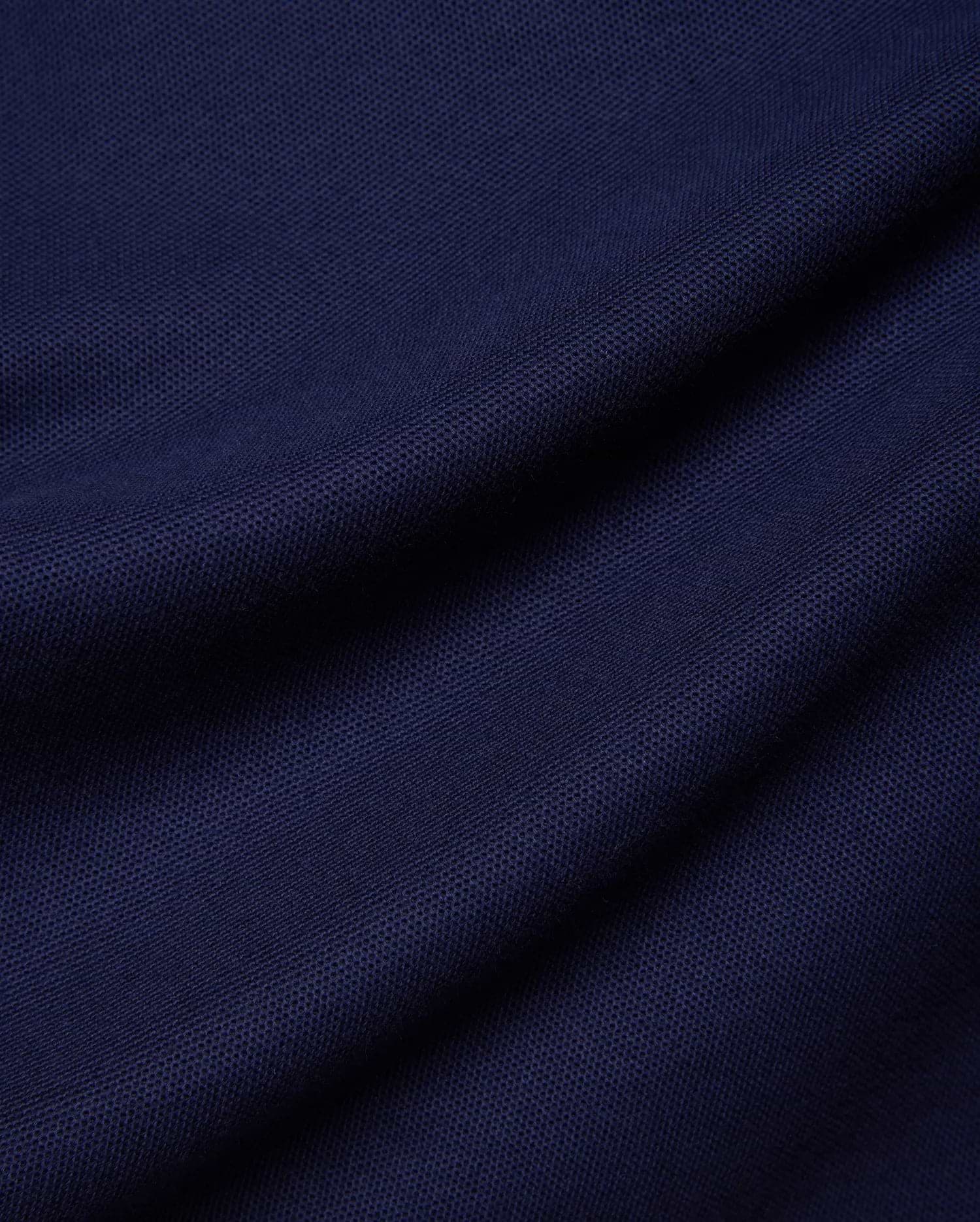Kids Holden Pique Polo in rich navy blue, a classic fit polo crafted from breathable pique fabric, featuring the iconic embroidered Psycho Bunny skull logo on the left chest.