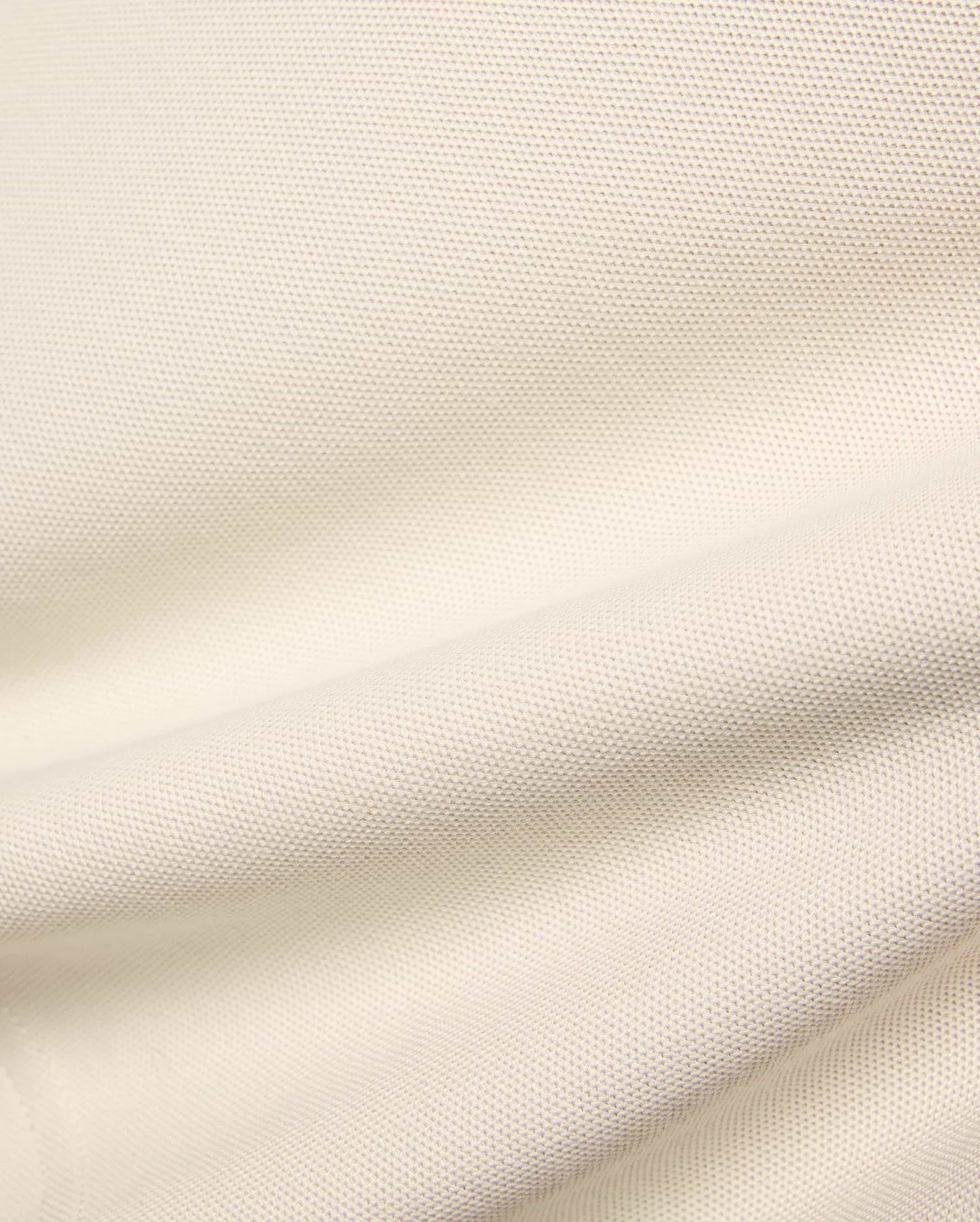Kids Holden Pique Polo fabric swatch in a soft cream hue, showcasing the classic textured pique knit, perfect for premium menswear, refined streetwear, and comfortable, stylish apparel.
