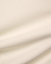 Kids Holden Pique Polo fabric swatch in a soft cream hue, showcasing the classic textured pique knit, perfect for premium menswear, refined streetwear, and comfortable, stylish apparel.