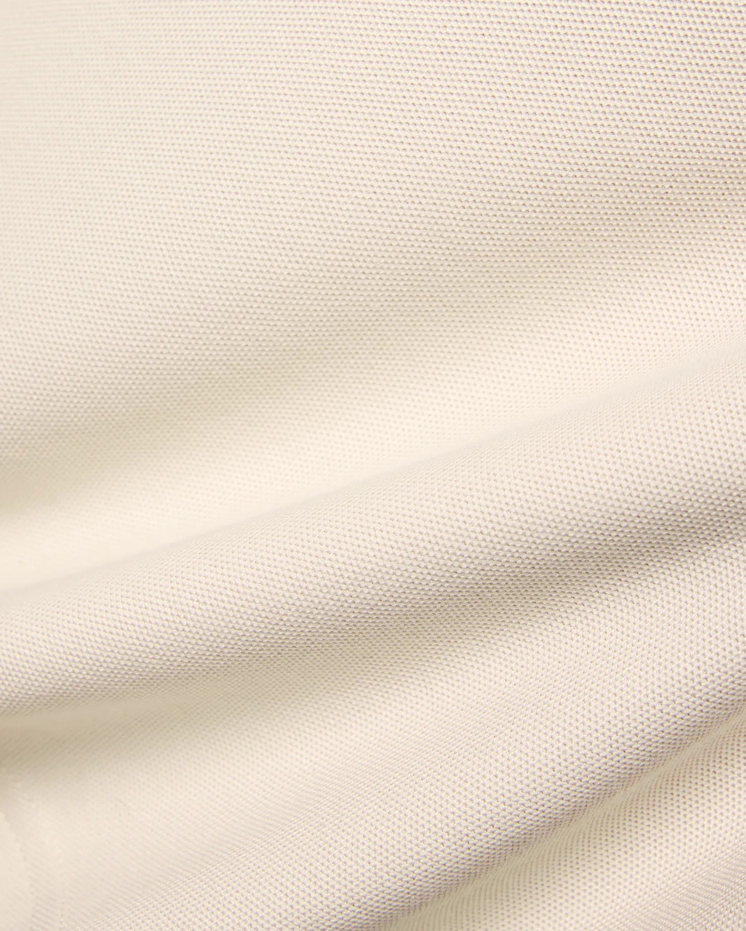 Kids Holden Pique Polo fabric swatch in a soft cream hue, showcasing the classic textured pique knit, perfect for premium menswear, refined streetwear, and comfortable, stylish apparel.