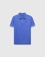 Kids Brad Pique Polo, royal blue classic fit pique polo with white tipped collar and cuffs, featuring a small embroidered purple Psycho Bunny skull logo on the left chest.